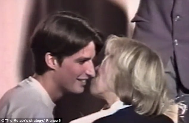 Footage captures the moment a 15-year-old Emmanuel Macron (left) kissed his 40-year-old teacher (right) - two years before he declared he wanted to marry her qhidqkiqkhiquxglv